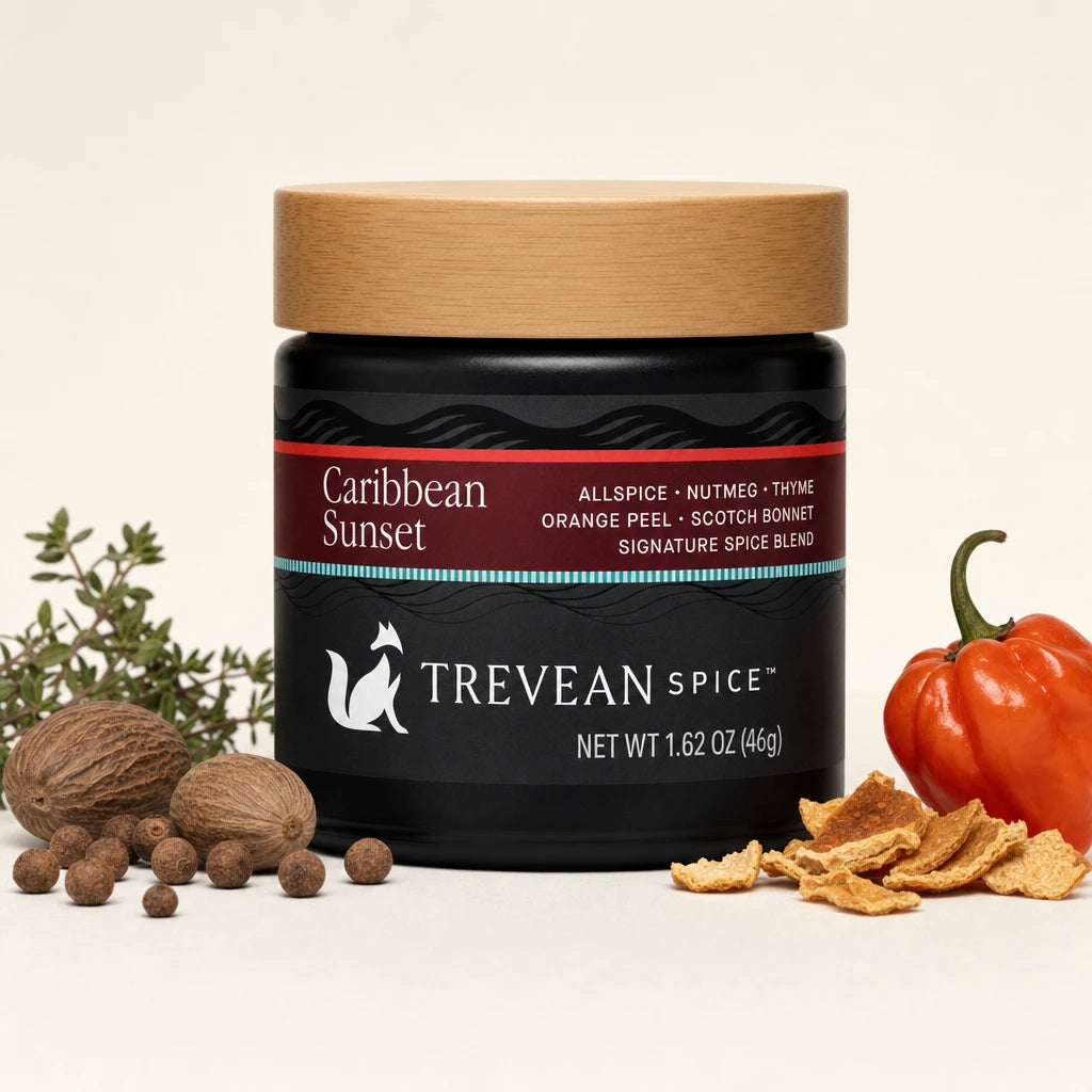 Caribbean Sunset spice blend, 46 g, in a black jar with bamboo lid and its featured ingredients